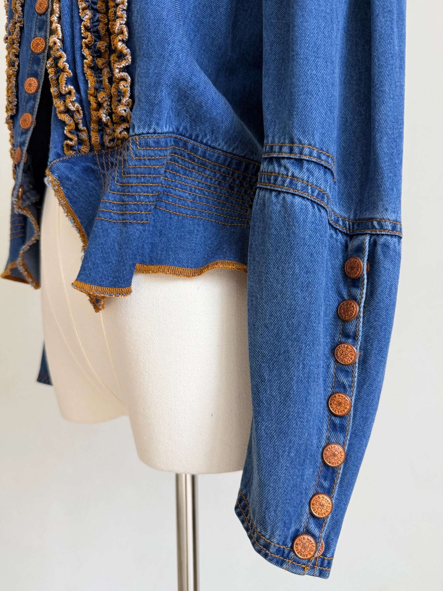 Denim Peplum Jacket with Ruffle Trim