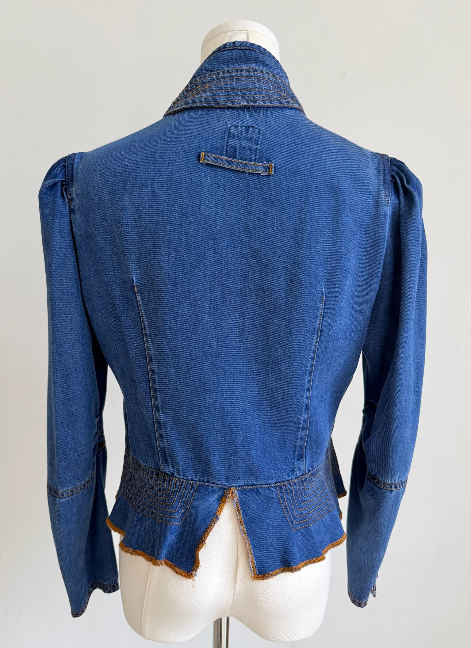Denim Peplum Jacket with Ruffle Trim
