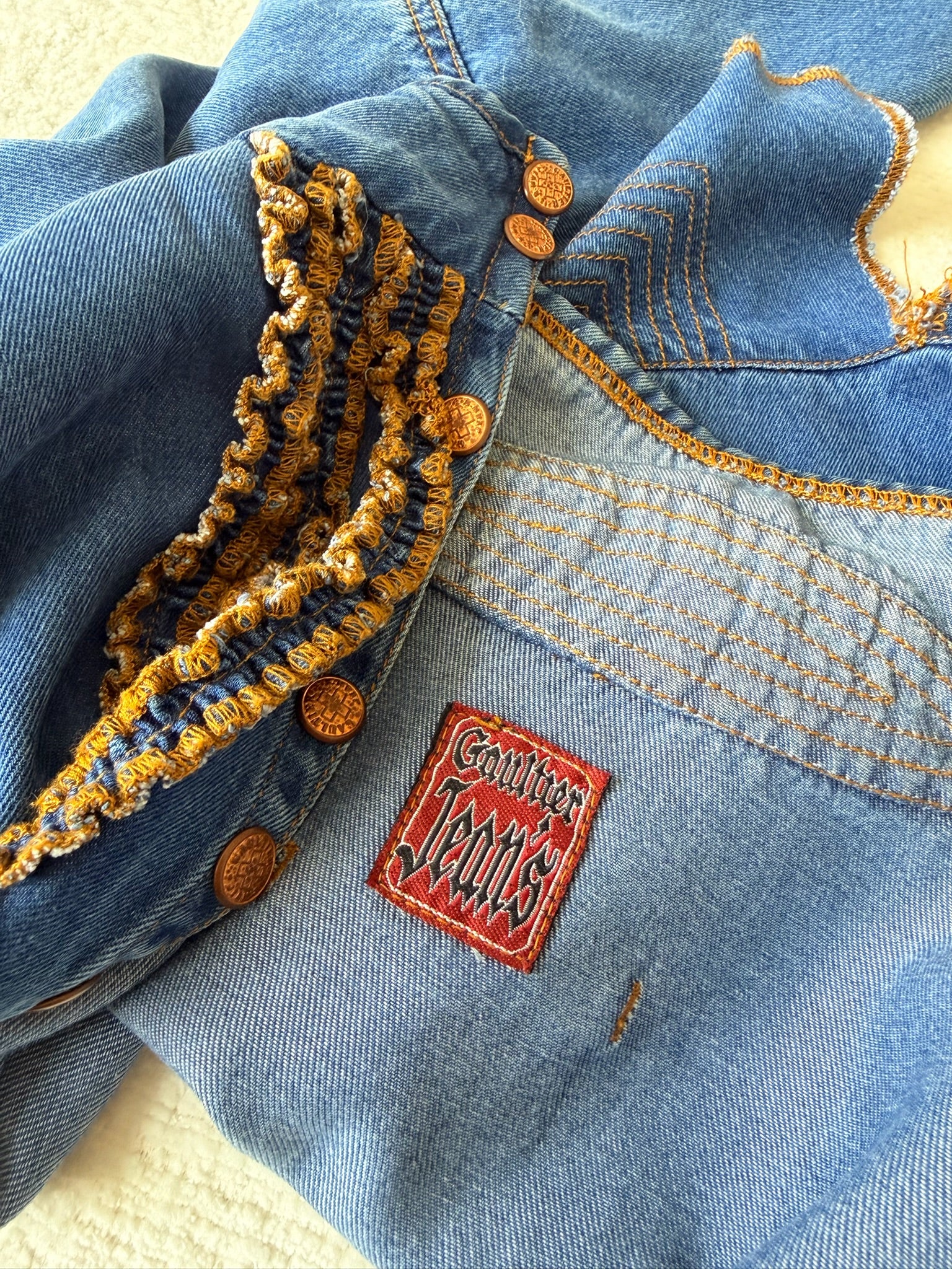 Denim Peplum Jacket with Ruffle Trim