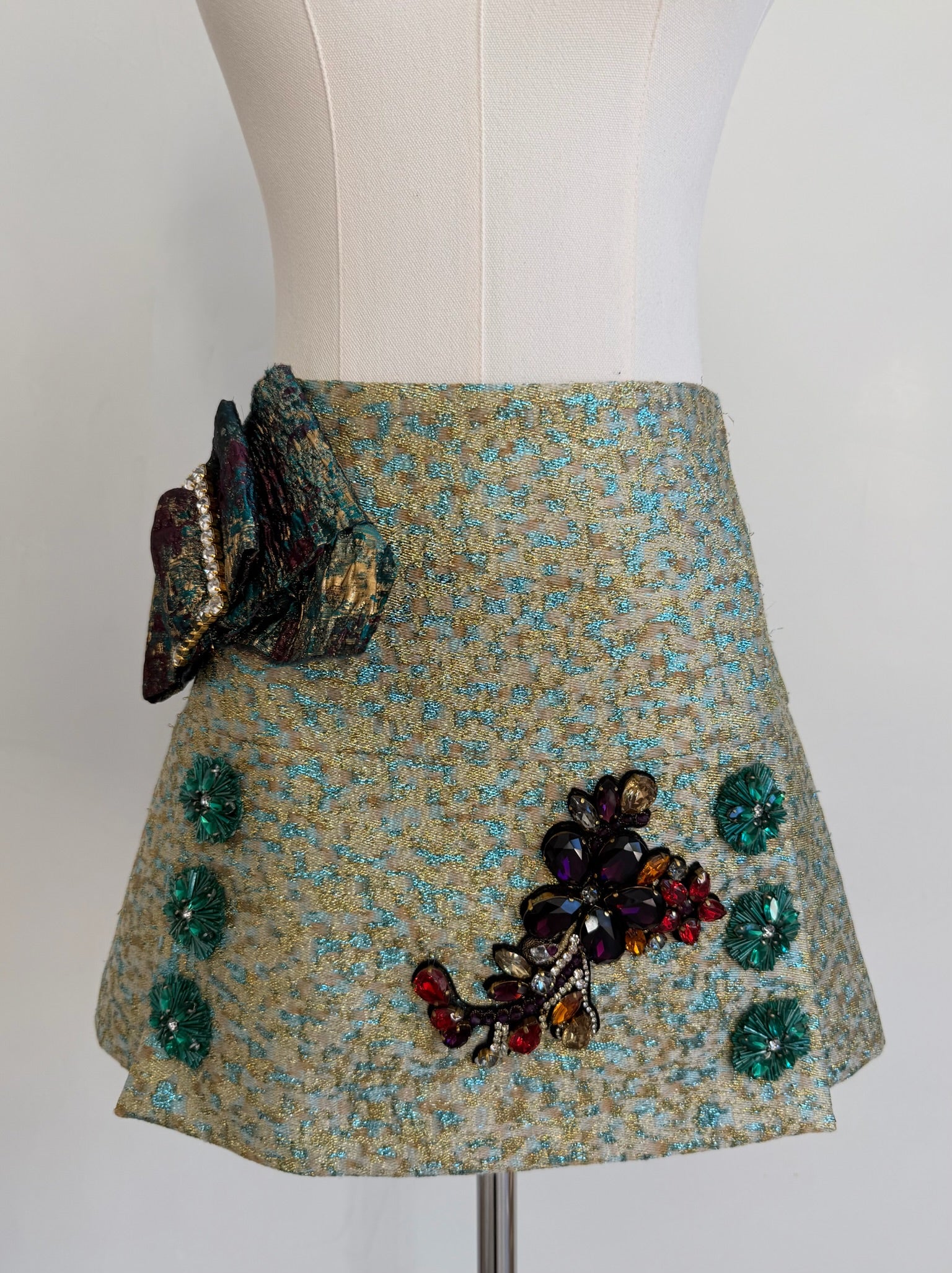 Green & Blue Metallic Jacquard Embellished Mini Skirt with Jewel Buckled Bow